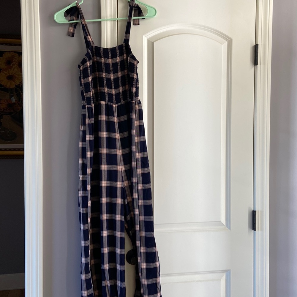 American Eagle jump suit size medium navy blue with tan plaid